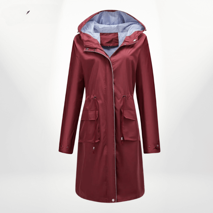 Black women's waterproof over-knee trench coat, a versatile and stylish long rain jacket for various occasions.