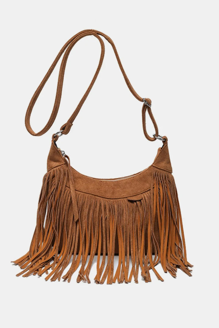 Women's suede fringe crossbody bag, perfect for boho chic style & festivals.