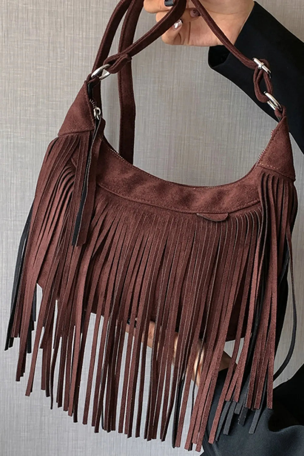 Boho style women's suede fringe crossbody bag, a statement festival shoulder purse.