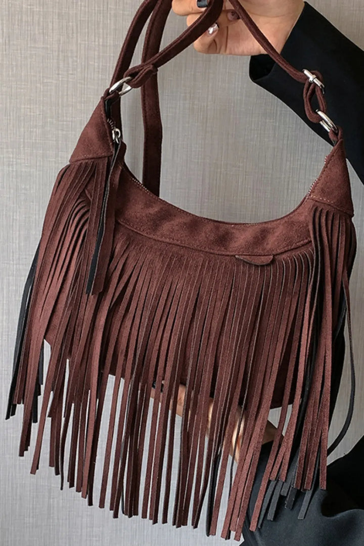 Boho style women's suede fringe crossbody bag, a statement festival shoulder purse.
