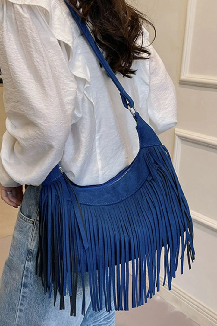 Womens boho suede fringe crossbody bag with tassel, perfect as a small shoulder purse or festival bag.