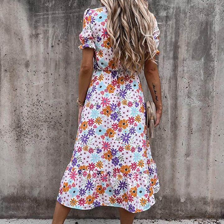 Stylish women's sleeveless midi dress, flowy and comfortable for summer casual or elegant vacation wear.
