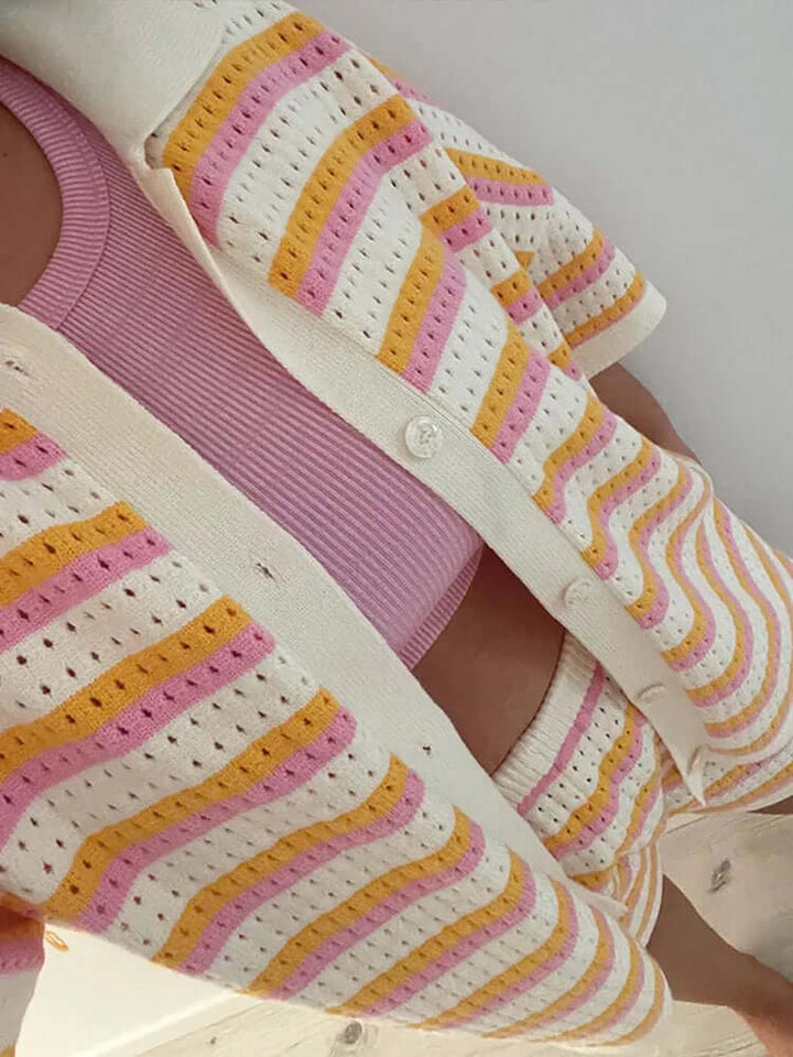 Stylish women's summer knit set featuring a striped pattern in pink and blue, perfect casual wear.