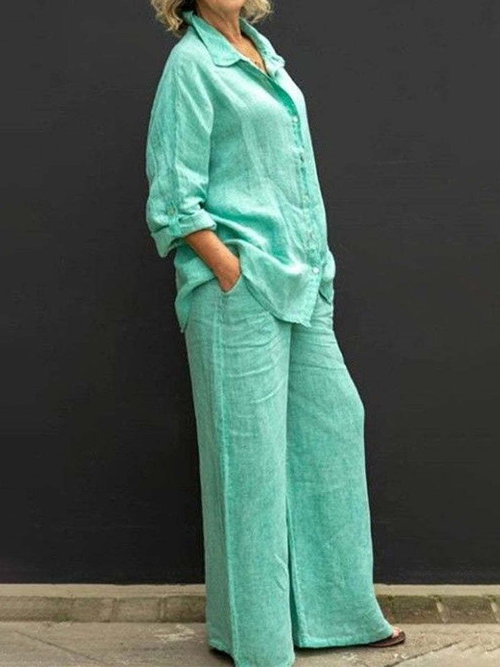 Women's summer two-piece set: stylish V-neck top & elastic waist cotton-linen pants. Comfortable & relaxed fit.