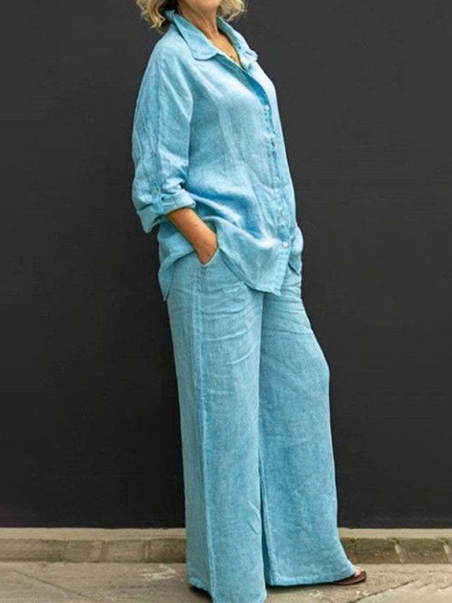 Effortless women's summer two-piece set for office casual or leisure. V-neck top & elastic waist pants.