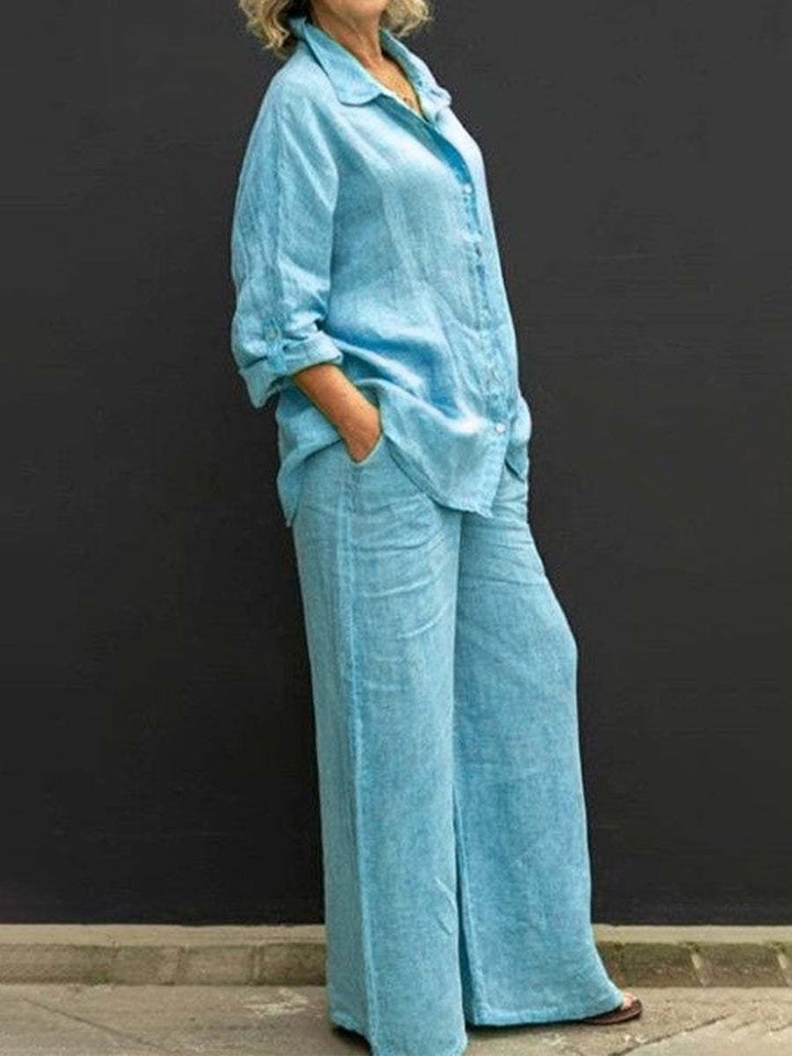 Effortless women's summer two-piece set for office casual or leisure. V-neck top & elastic waist pants.