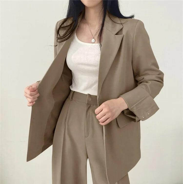 Sophisticated women's tailored blazer and straight-leg pants for a polished look.