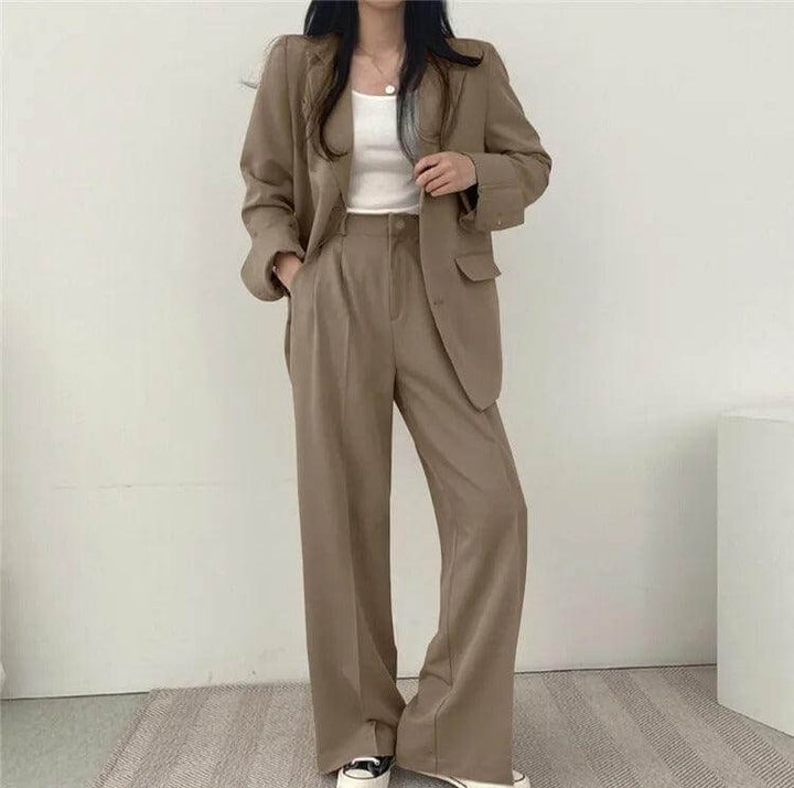 Women's versatile tailored blazer and straight-leg pants, great for office or events.