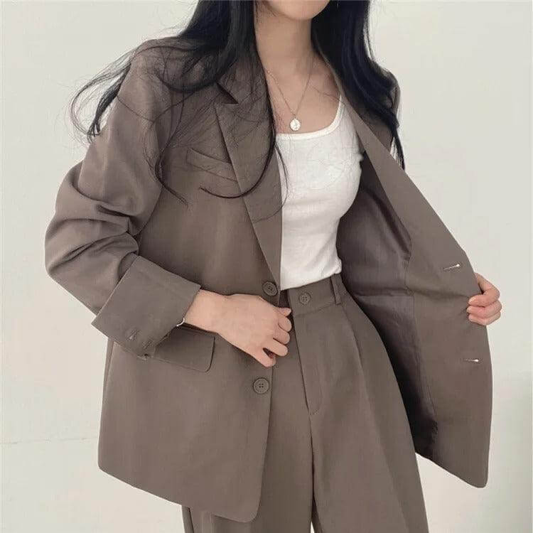 Workwear women's set featuring a sharp tailored blazer & classic straight-leg pants.