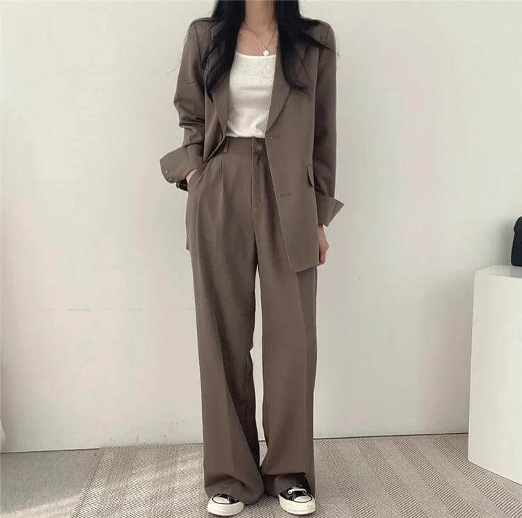 Women's chic two-piece tailored blazer and straight-leg pants for a polished outfit.