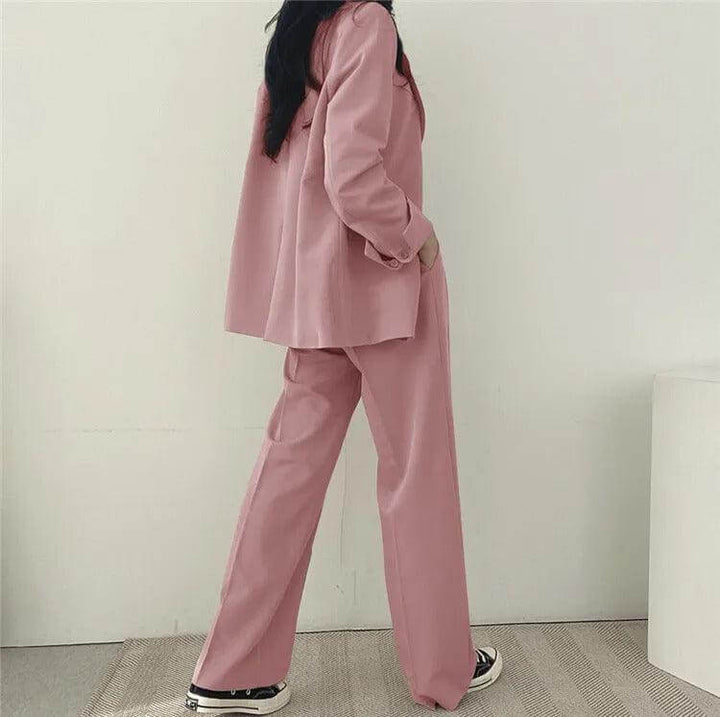 Versatile women's set featuring a sleek tailored blazer and comfortable straight-leg pants.