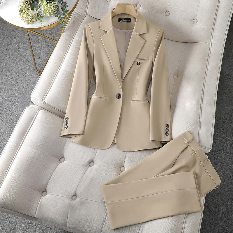 Elegant women's formal blazer with matching tailored trousers. Professional attire for work & business events.