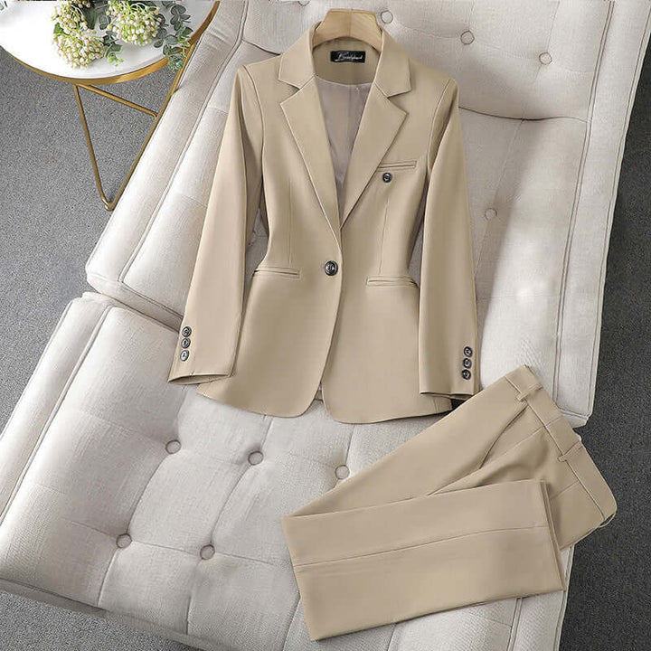 Elegant women's formal blazer with matching tailored trousers. Professional attire for work & business events.