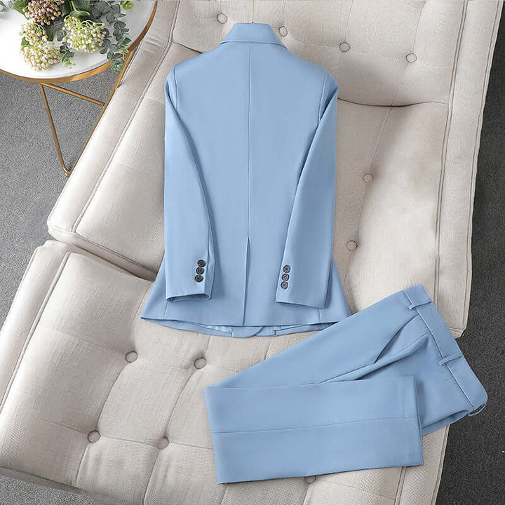 Complete women's tailored suit: stylish blazer & trousers for a polished professional office business look.