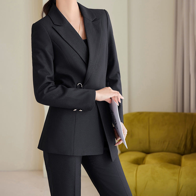 Women's tailored formal blazer and trouser set, ideal for business attire, professional meetings, and elegant workwear.