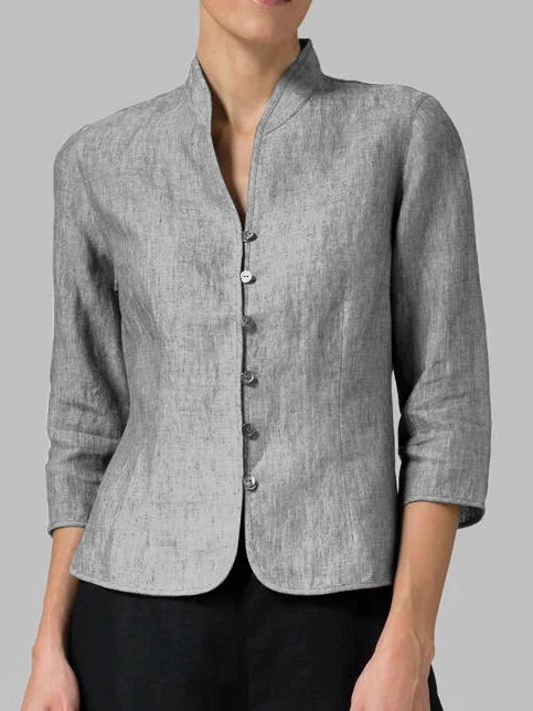 Elegant women's tailored linen blazer, showing a flattering fit. Ideal lightweight outerwear for sophisticated fashion.
