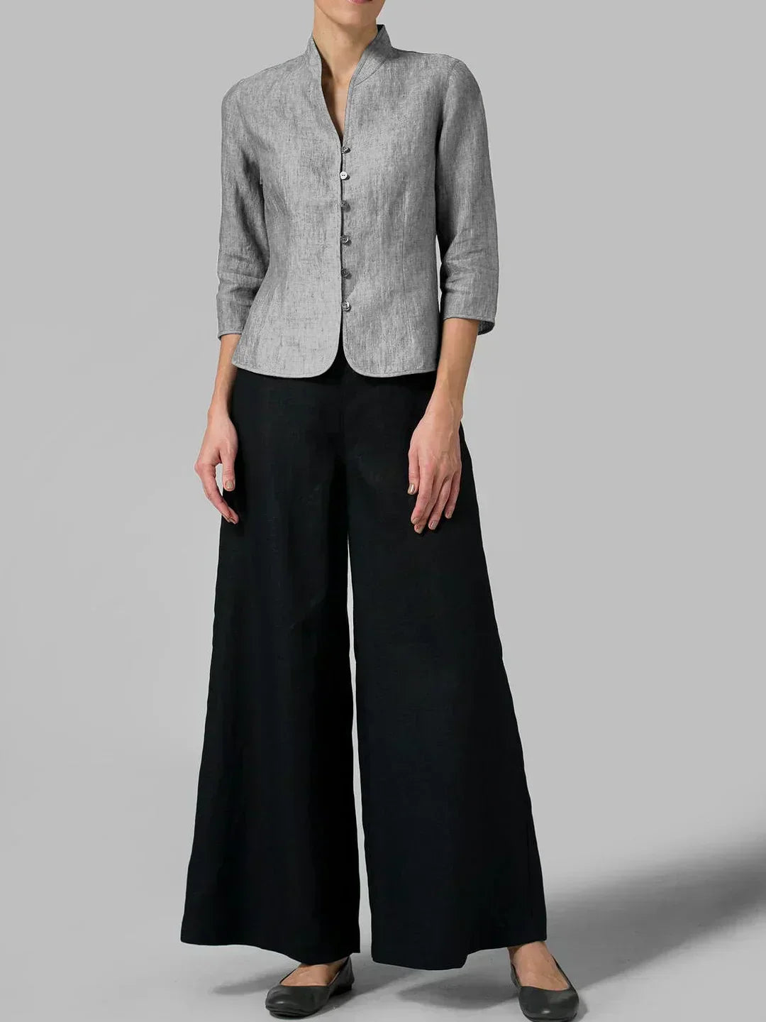 Textured image of a women's lightweight linen blazer. Soft, breathable material makes it ideal for warm weather style.