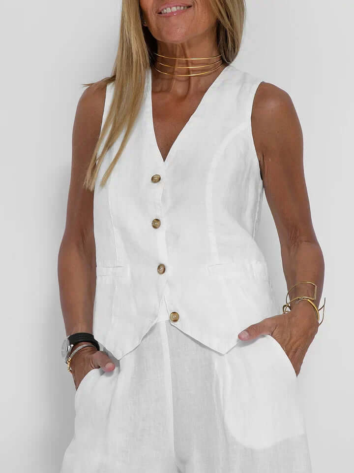 Black women's tailored linen vest and matching trousers, breathable and stylish for summer.