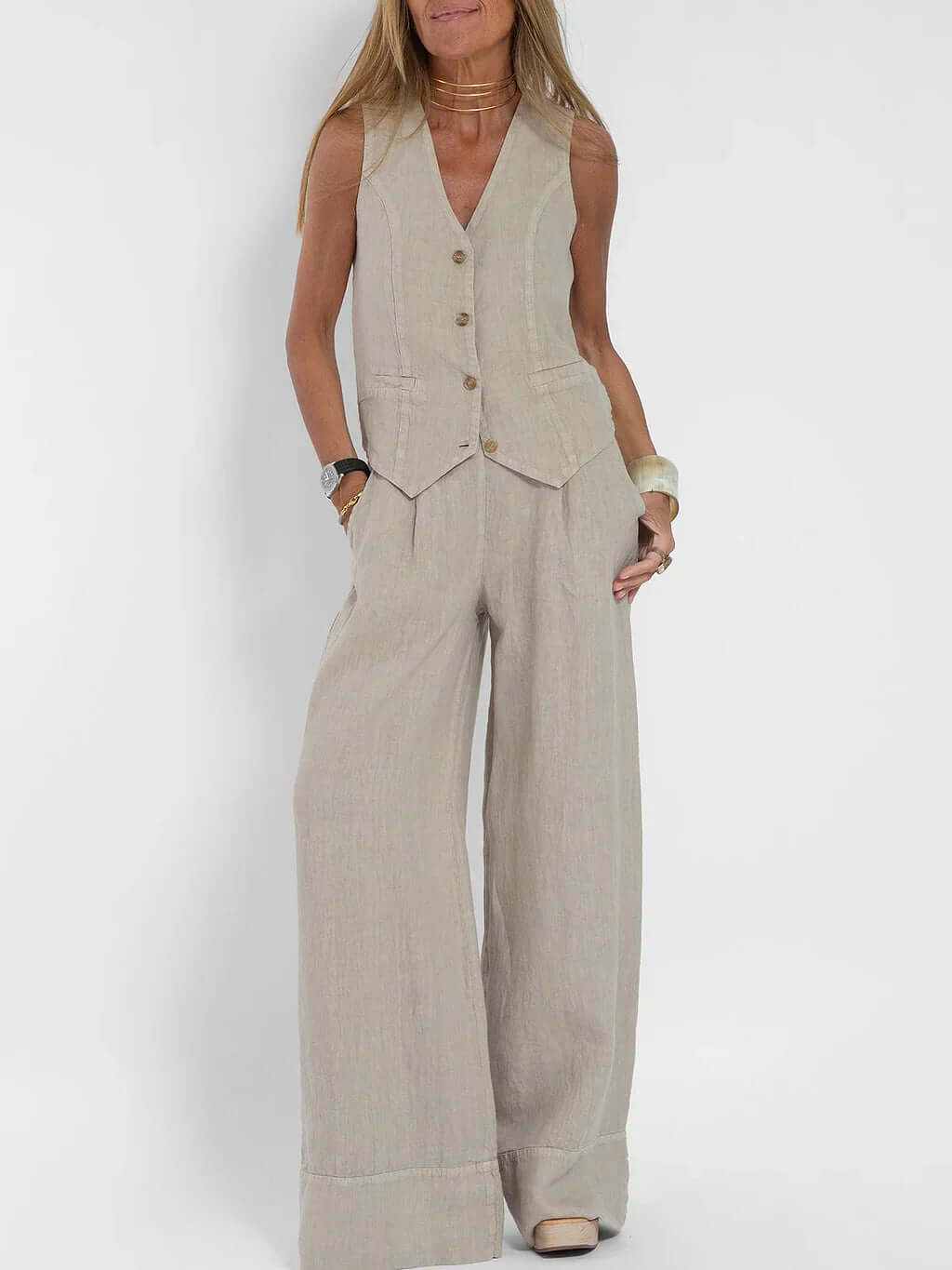 Stylish women's linen two-piece vest set with high-waisted pants, available in black, white, olive.