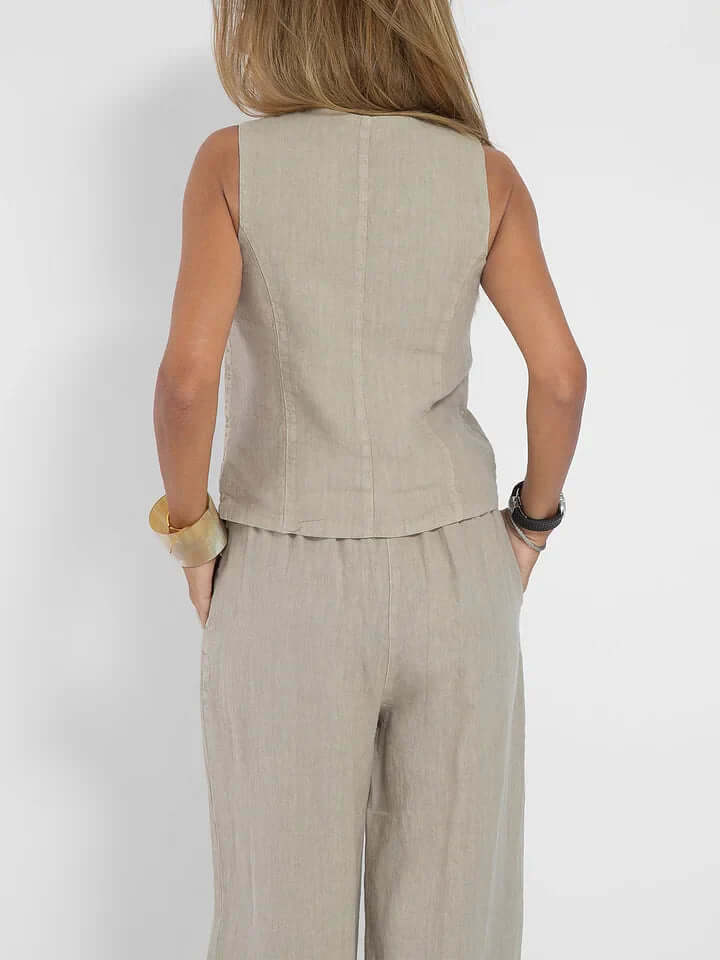 Versatile women's linen two-piece vest set, perfect for casual or elegant summer resort wear.