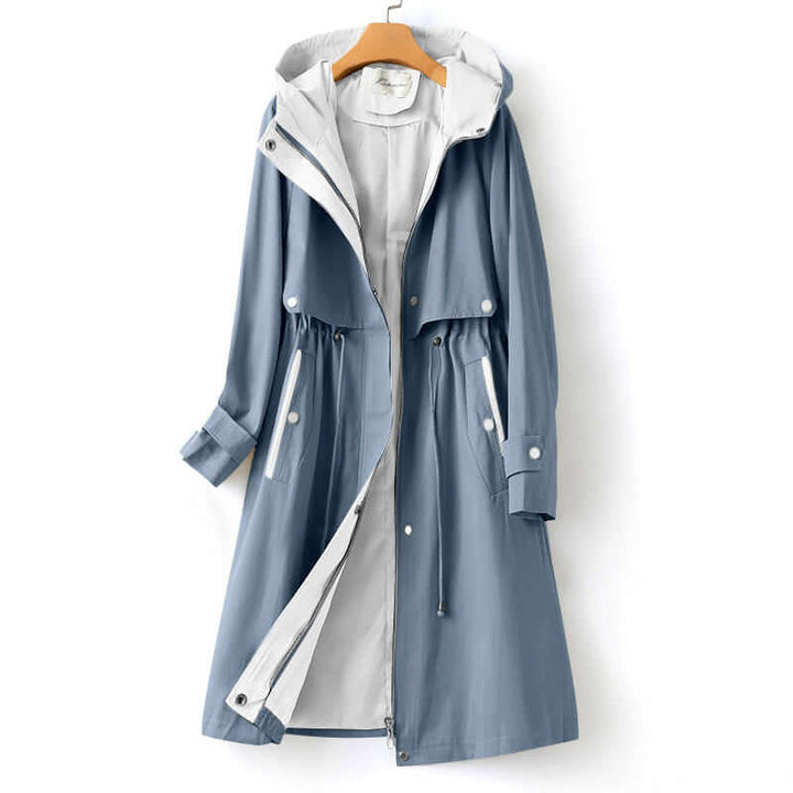 Lightweight women's tailored windbreaker jacket offers protection from wind, ideal for outdoor activities in spring and fall.