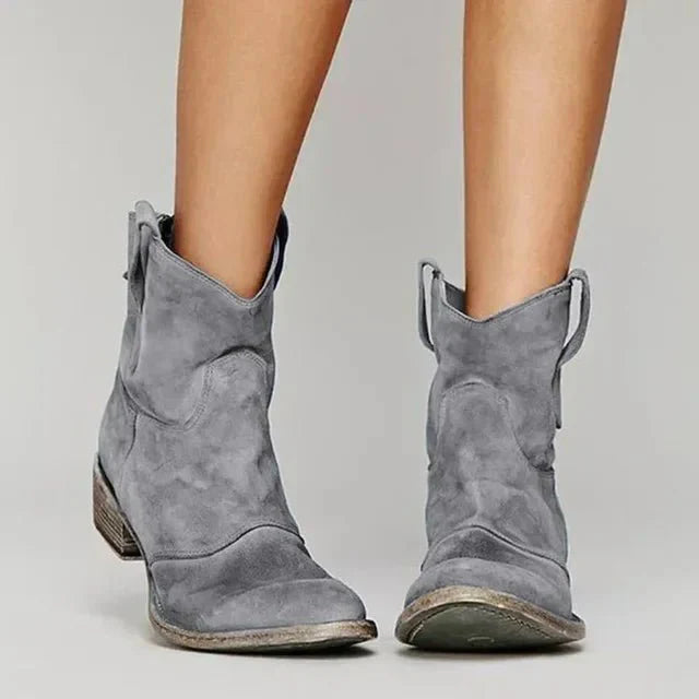 Comfortable women's ankle boots: grey suede with a western aesthetic and practical block heel.