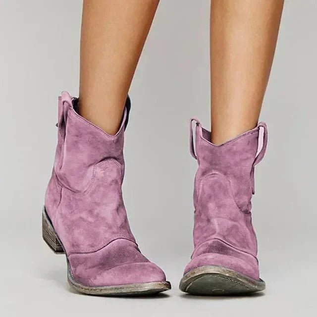 Fashionable women's black suede western ankle boots with a durable block heel, ideal for everyday wear.