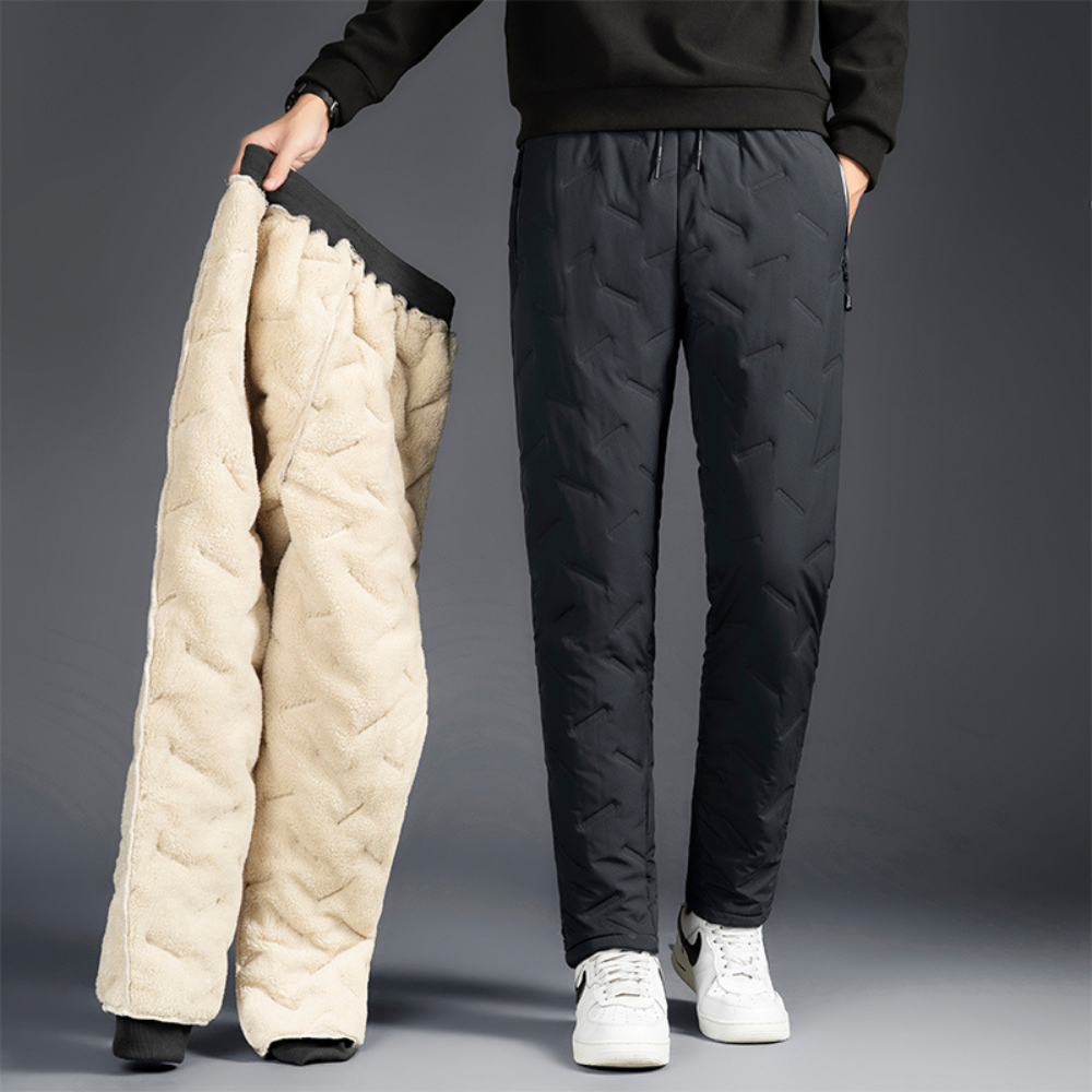 Fleece-lined thermal waterproof pants for women, ideal for winter hiking, skiing, and outdoor adventure.