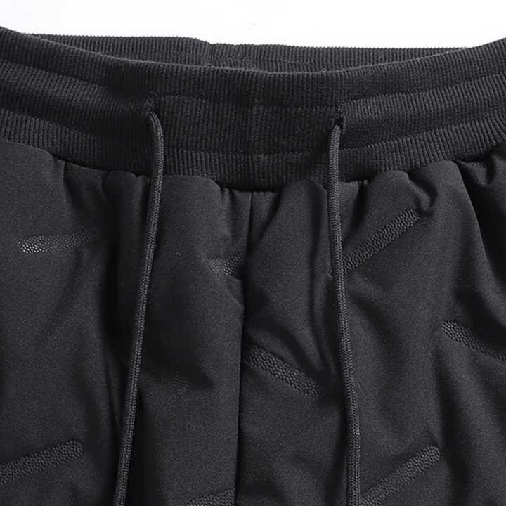 Comfortable women's thermal waterproof trousers with soft fleece lining, perfect for ultimate winter warmth.
