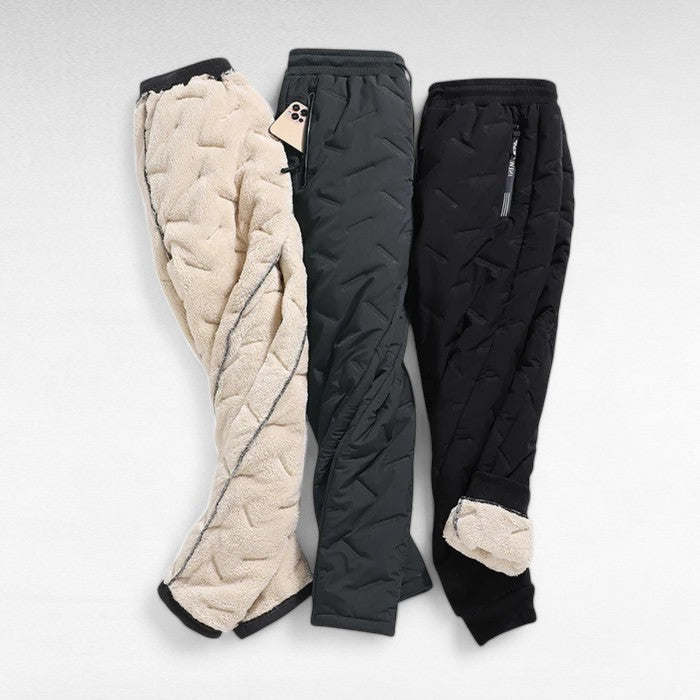 Versatile women's thermal waterproof pants, fleece-lined, ideal for hiking, walking, and winter outdoor activities.