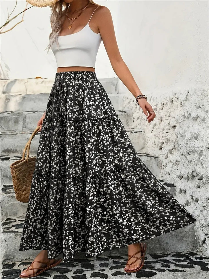 Casual women's summer tiered floral maxi skirt, a comfortable and stylish long vacation skirt.
