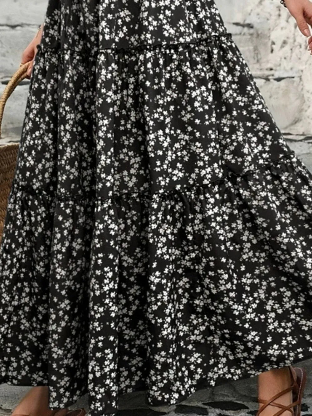 Tiered floral long maxi skirt for women, elegant and flowy summer attire.