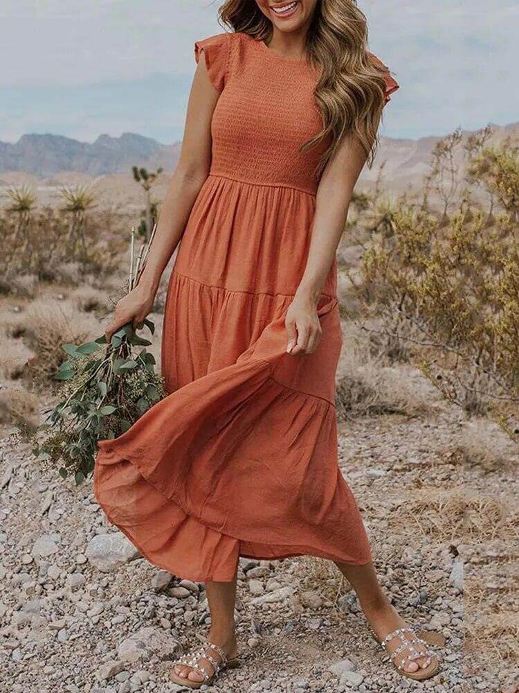 Women's tiered midi dress with elegant flutter sleeves, perfect for summer casual wear.