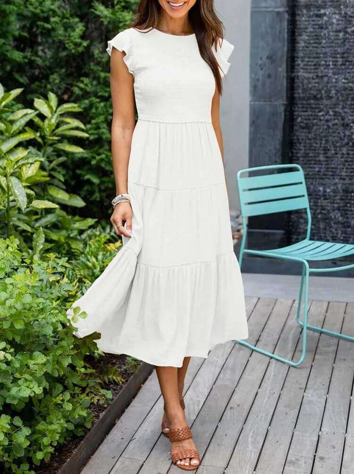Elegant women's summer dress, tiered midi length, flattering flutter sleeves, for a polished look.