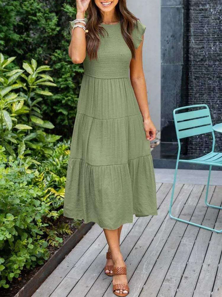 Casual women's tiered midi dress, smocked bust, airy flutter sleeves, in a soft rayon blend.