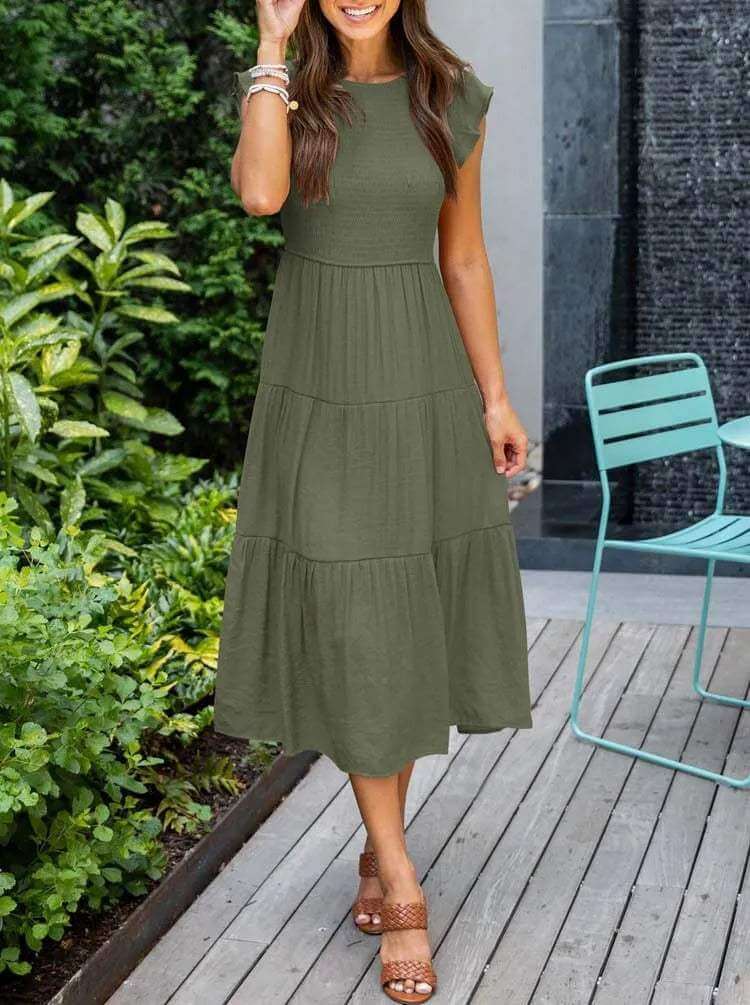Casual A-line women's midi dress, smocked bodice, flutter sleeves, made from rayon blend.