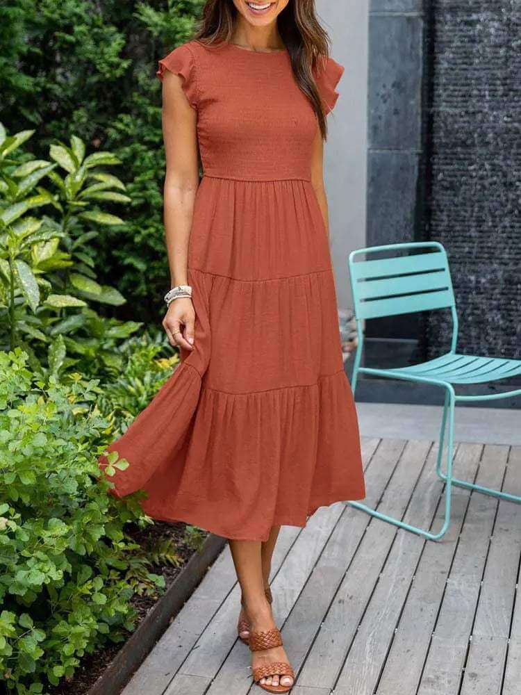Lightweight rayon blend women's midi dress, tiered design, with stylish flutter sleeve detail.