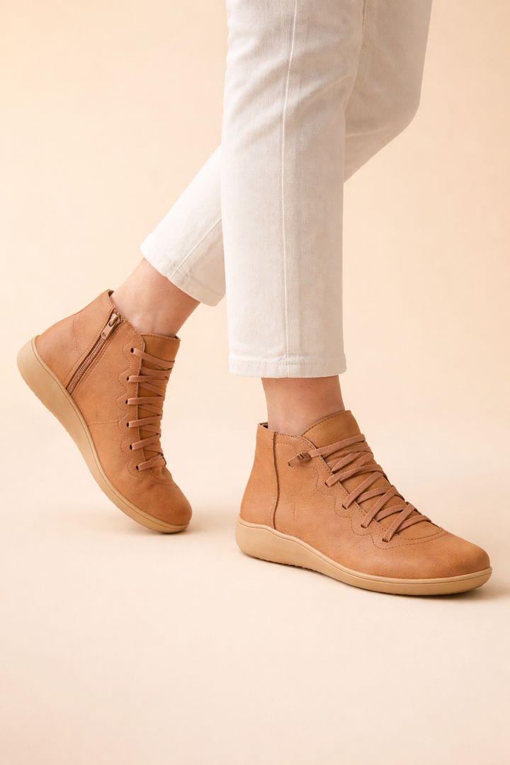 Women's trendy orthopedic ankle boots, stylish and comfortable, offering foot support for all-day wear.