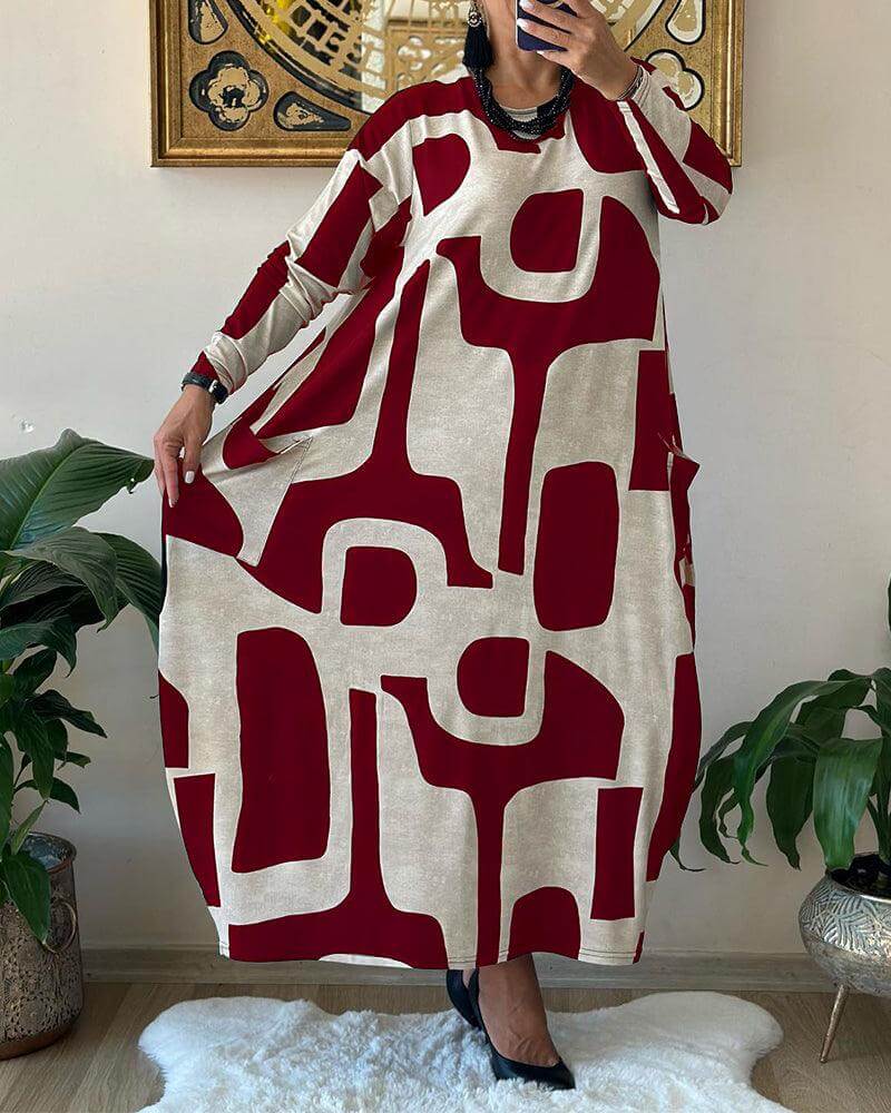 Stylish long sleeve women's dress with a beautiful print, ideal for effortless spring or fall fashion.