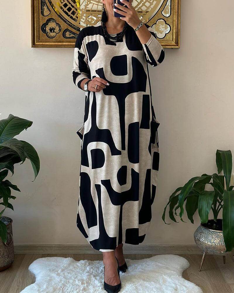 Vibrant printed long sleeve women's dress, combining comfort with contemporary elegance for all seasons.