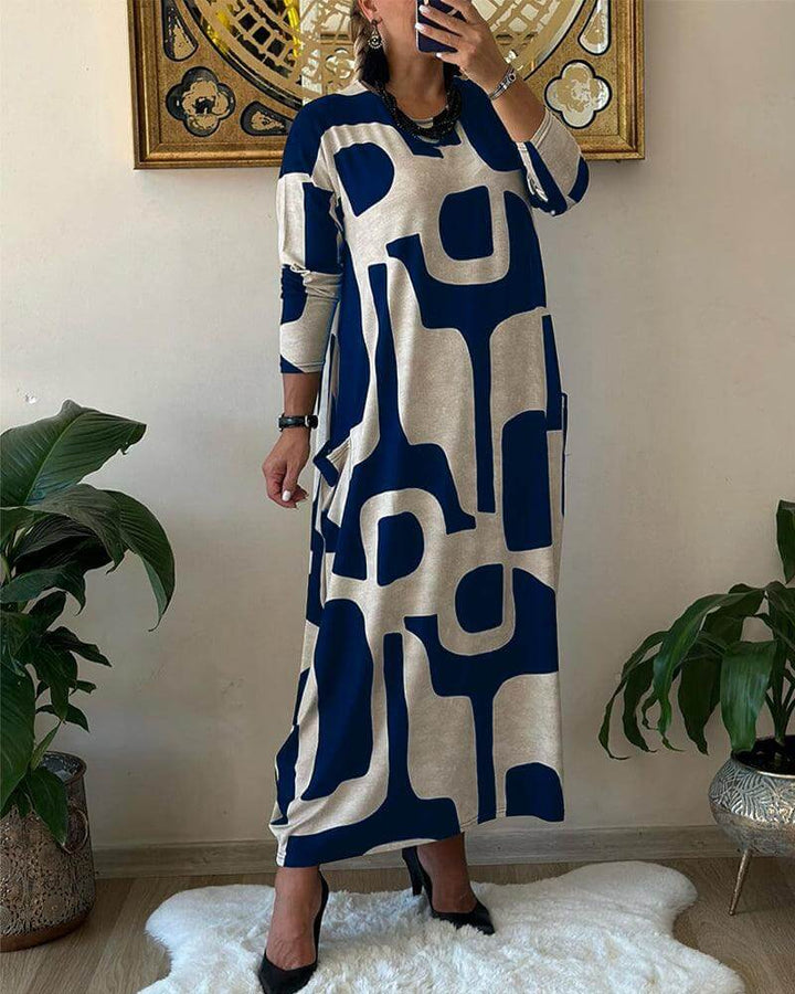 Sophisticated women's printed dress with long sleeves, offering a trendy and comfortable fashion statement.