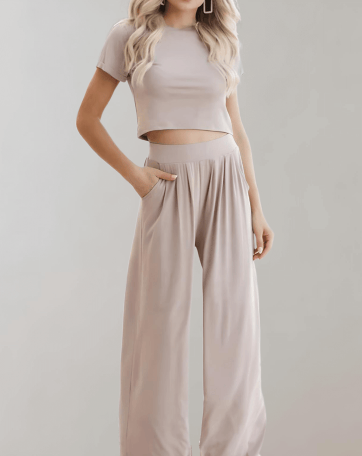 Women's two-piece co-ord set featuring a tailored blazer & mini skirt. Chic & fashionable for business casual or party.