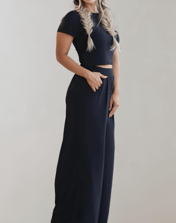 Elegant women's matching blazer and mini skirt co-ord set. Versatile two-piece outfit for office or party wear.