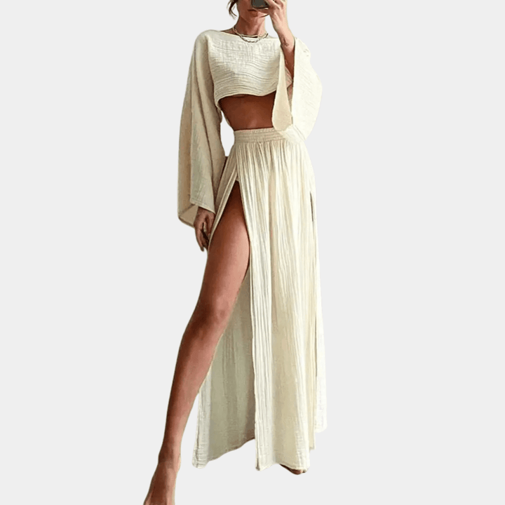 Chic women's two-piece set: flowy maxi skirt with high slit & comfortable crop top. Ideal for summer vacation.