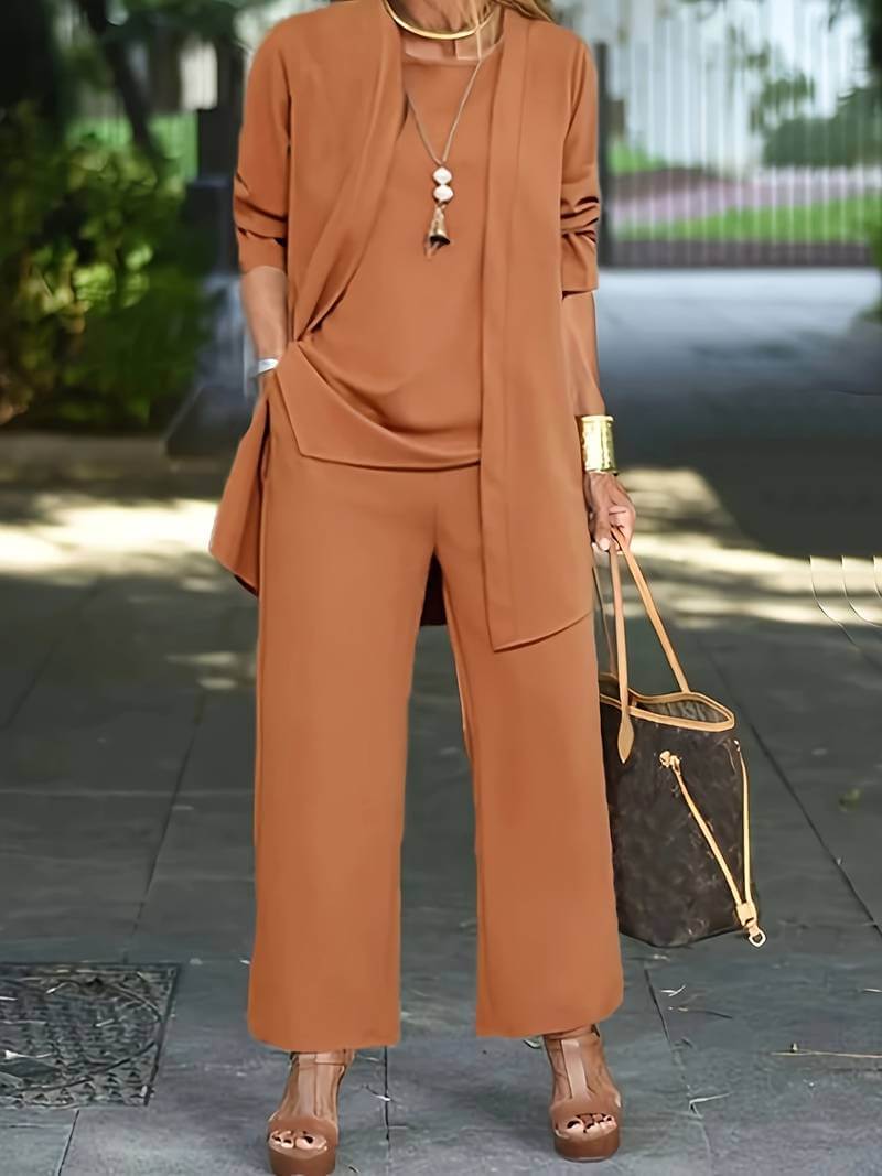 Women's two-piece vest & wide-leg pants set, perfect for business casual and office wear. Stylish coordinated outfit.