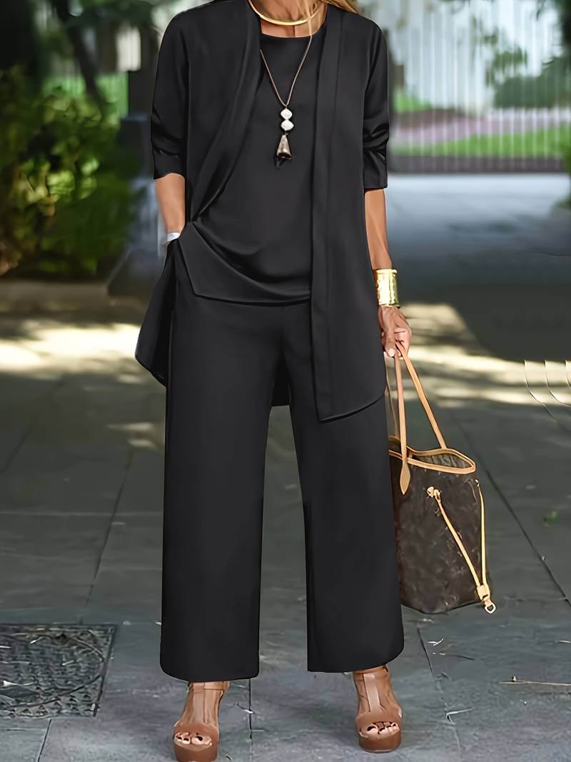 Elegant women's sleeveless vest & wide-leg trousers set. Ideal for formal wear, business meetings, or stylish events.
