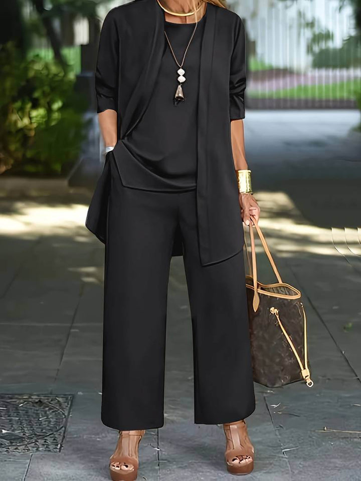 Elegant women's sleeveless vest & wide-leg trousers set. Ideal for formal wear, business meetings, or stylish events.