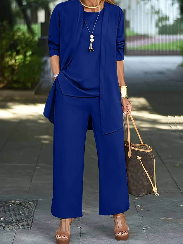 Chic women's two-piece suit with a sleeveless vest top & high-waisted wide-leg pants. Business casual fashion.