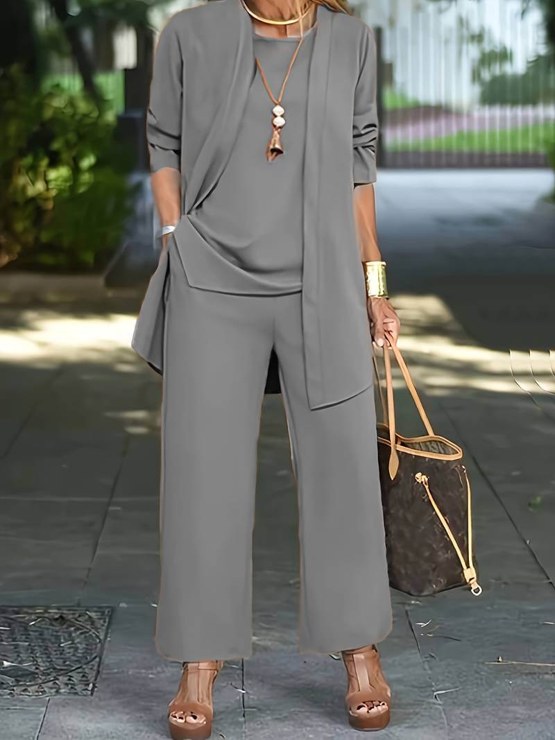 Stylish women's vest and wide-leg pants set. Versatile two-piece for business casual, office, or elegant occasions.