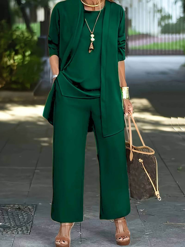 Women's elegant vest & wide-leg pants set. A modern two-piece outfit, ideal for formal wear, business, or fashion.